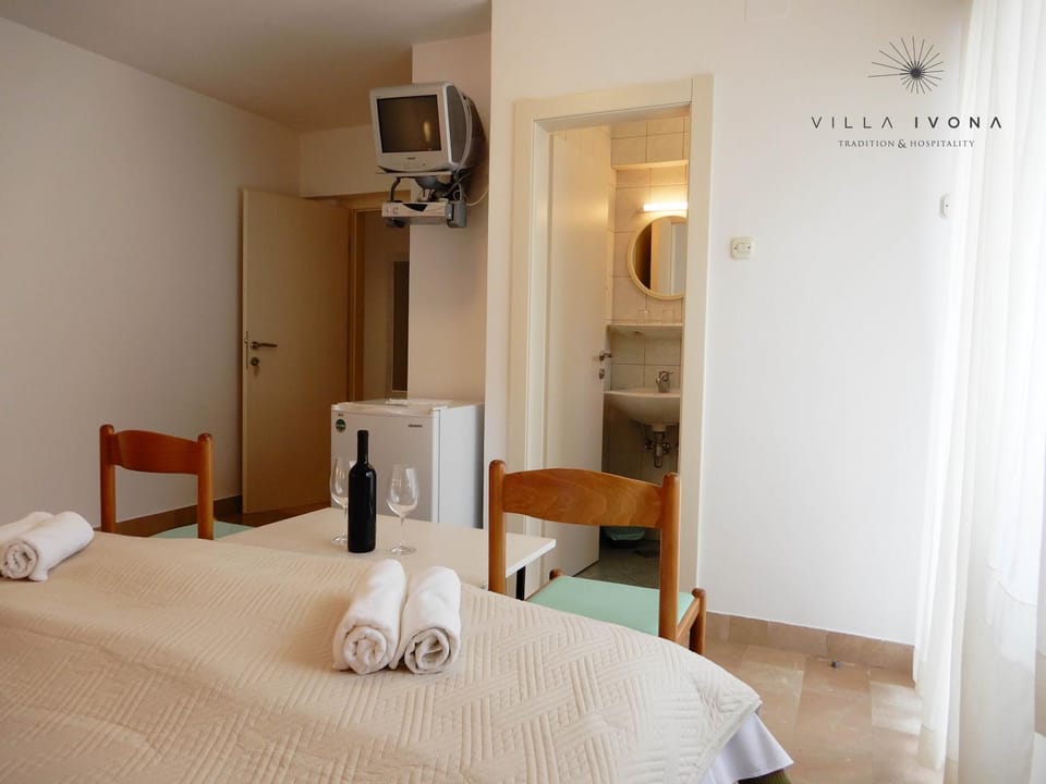 Property logo or sign, Bathroom, Decorative detail, Bedroom