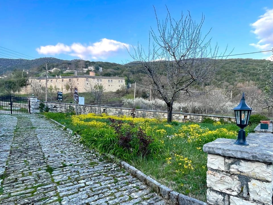 Property building, Nearby landmark, Spring, Day, Neighbourhood, Natural landscape, Garden, Garden view, Mountain view