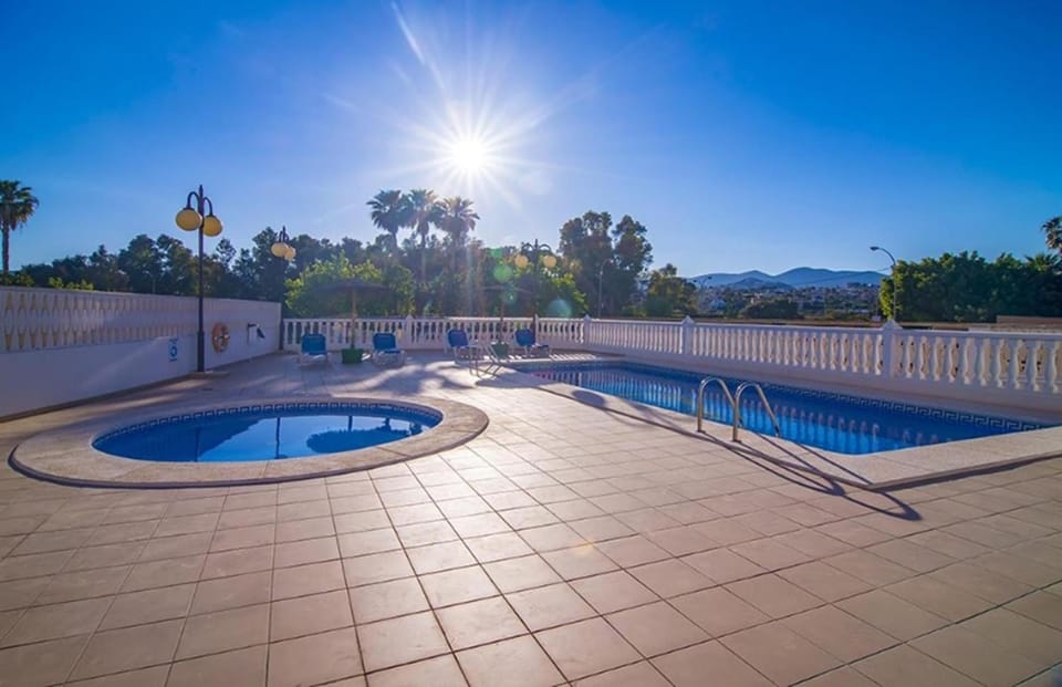 Swimming pool, sunbed