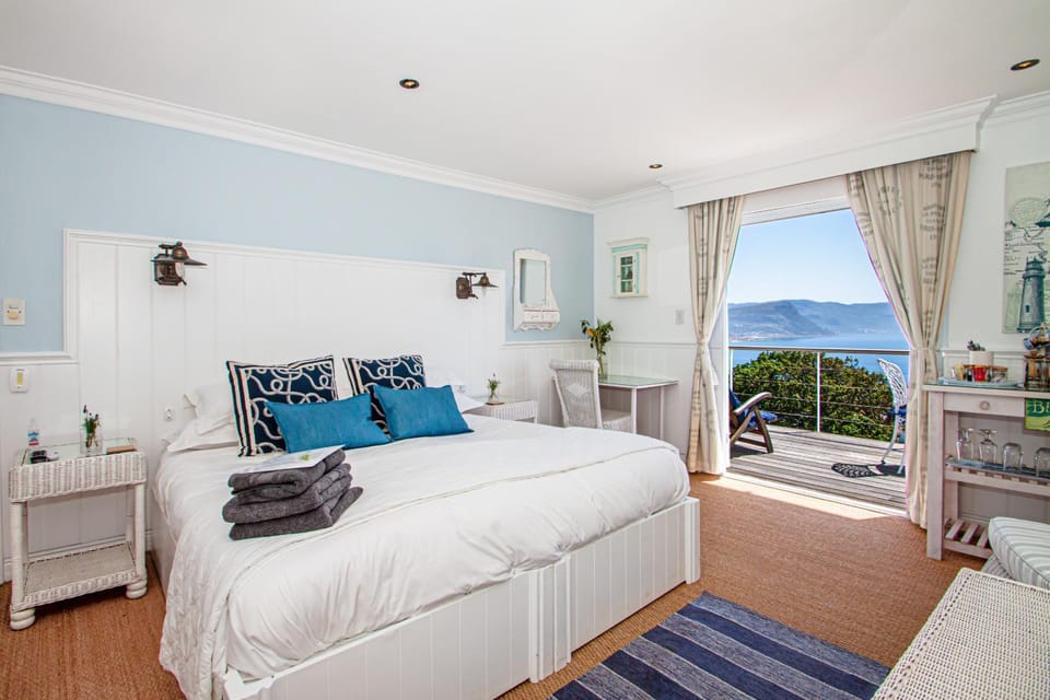 Bed, Natural landscape, Seating area, Bedroom, Sea view