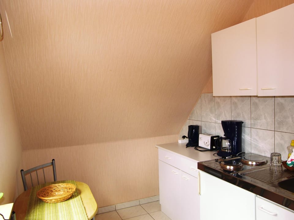 Kitchen or kitchenette, toaster