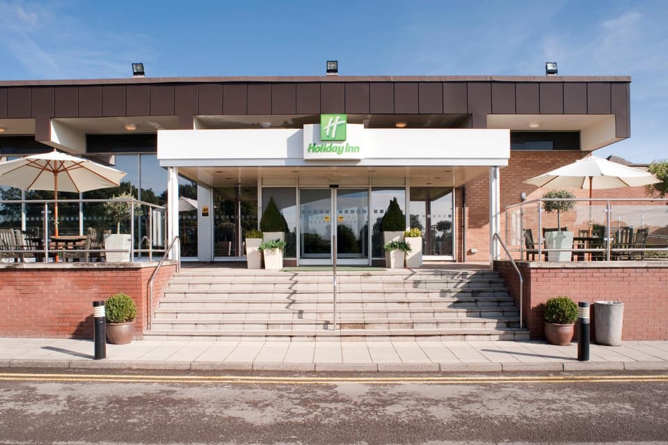 Facade/entrance, Day, Property logo or sign, Summer
