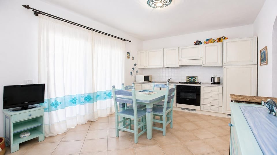 Kitchen or kitchenette, dishwasher, oven, stove