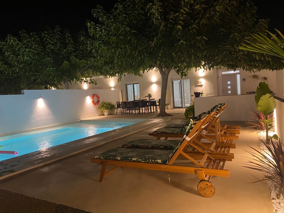 Night, Pool view, Swimming pool, sunbed