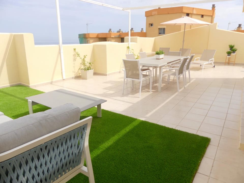 Patio, Staff, Staff, People, People, BBQ facilities, Garden, Balcony/Terrace, Food and drinks, On site, Guests, Guests, Sea view, Area and facilities, children, children, young children, young children, older children, older children, group of guests, group of guests, Family, Family