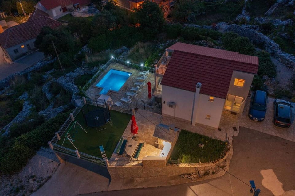 Property building, Night, Bird's eye view, Pool view, Street view, Swimming pool, sunbed