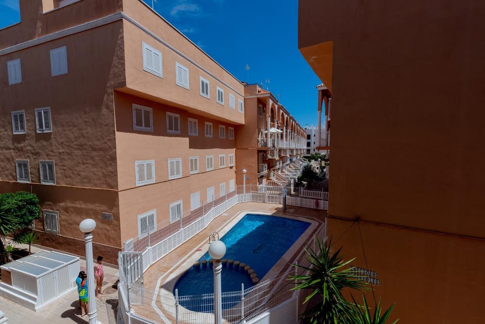 Property building, Day, Pool view, Swimming pool