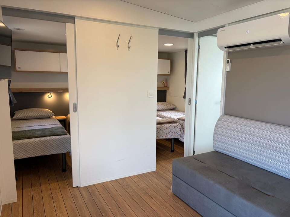 Bed, Photo of the whole room, Bedroom, towels, air conditioner
