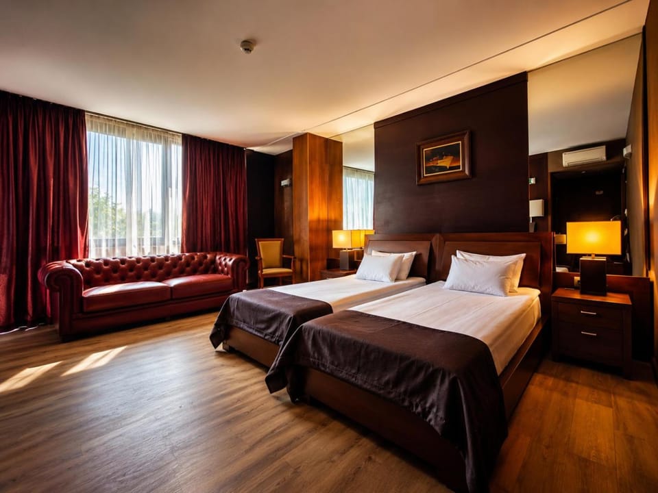 Bed, TV and multimedia, Seating area, Quiet street view, furniture, air conditioner