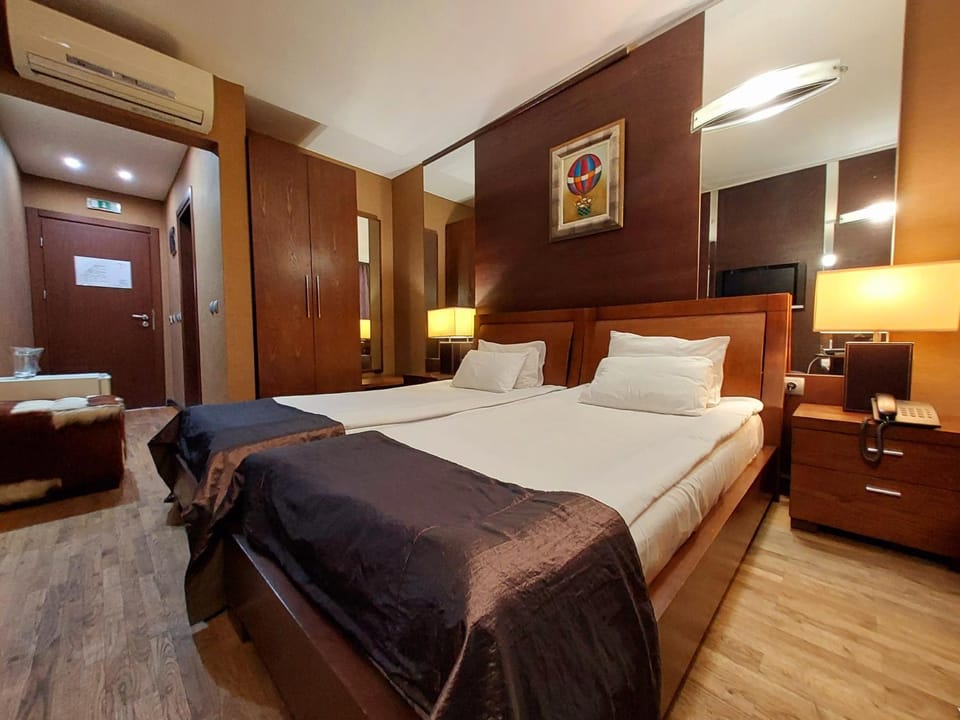 Bed, Quiet street view, hair dresser, oven, wardrobe, air conditioner