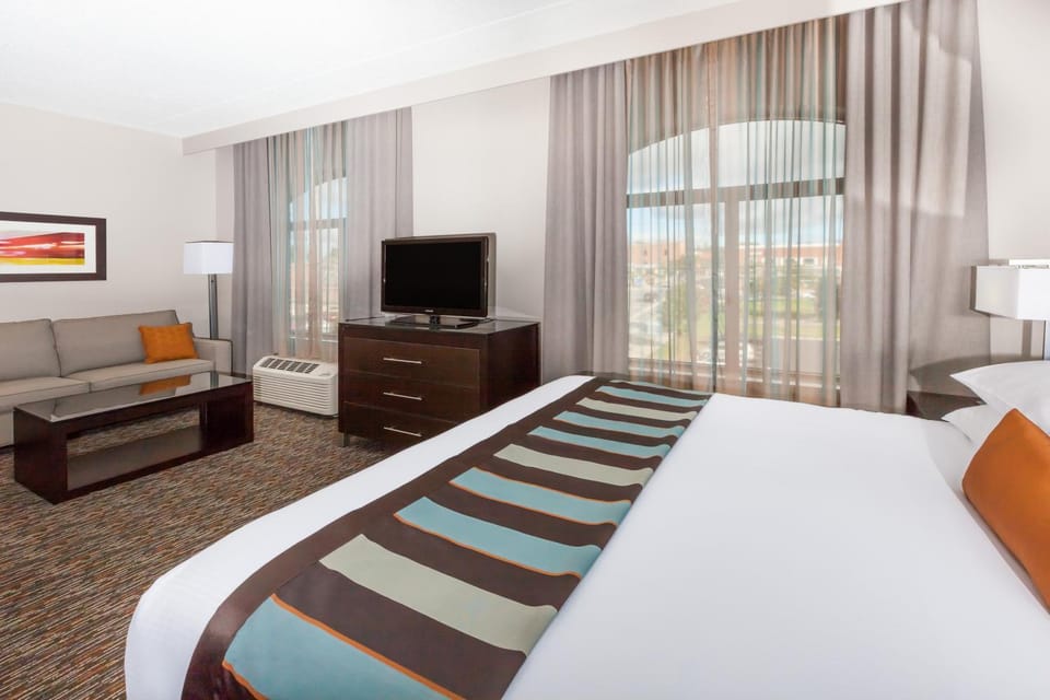 Bed, Living room, Seating area, City view