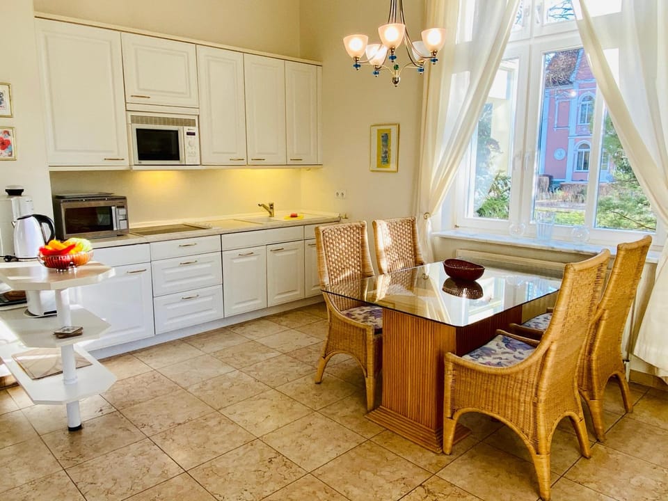 Kitchen or kitchenette, Living room, Dining area, cot