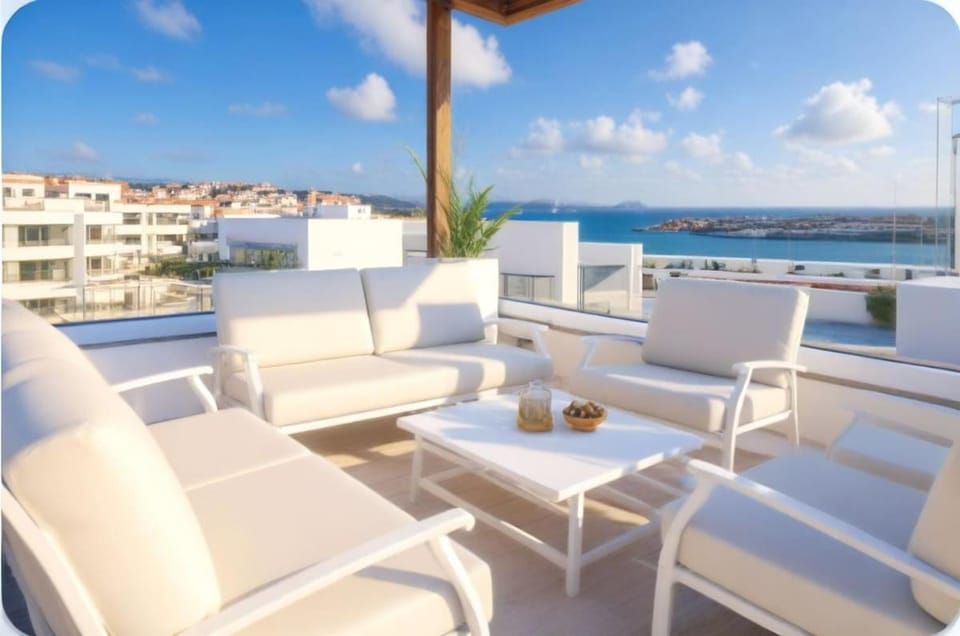 Property building, Patio, Day, Natural landscape, View (from property/room), Living room, Seating area, Dining area, City view