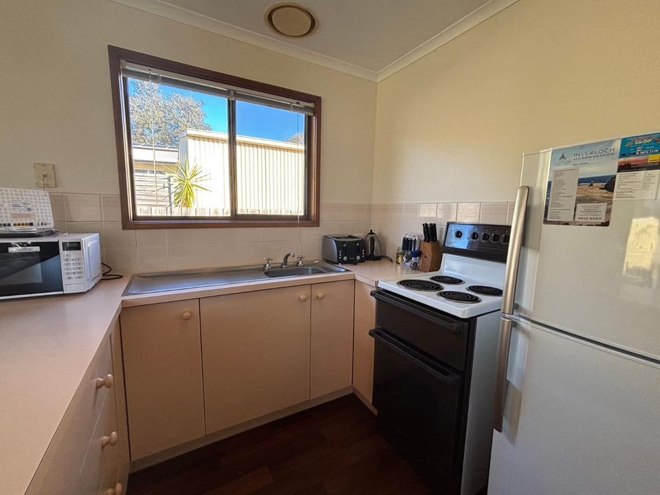Kitchen or kitchenette, stove