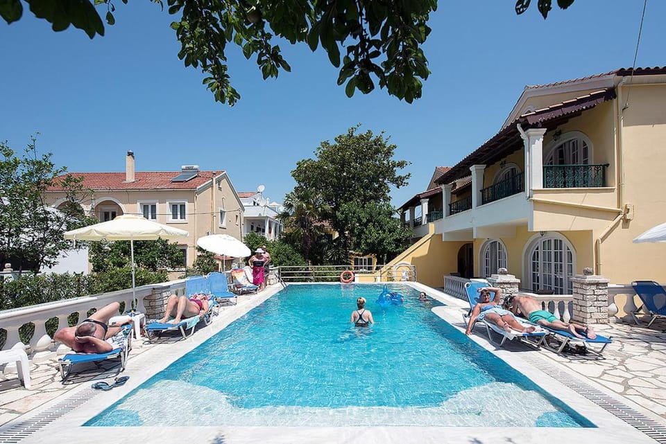 Property building, People, Pool view, Swimming pool, Swimming pool
