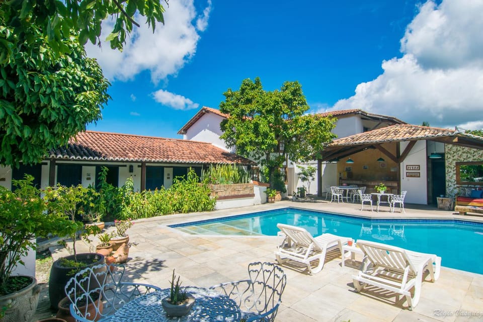 Property building, Patio, Spring, Day, Garden, Pool view, Swimming pool, sunbed