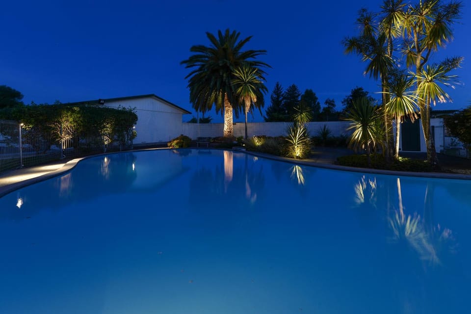 Property building, Text overlay, Swimming pool