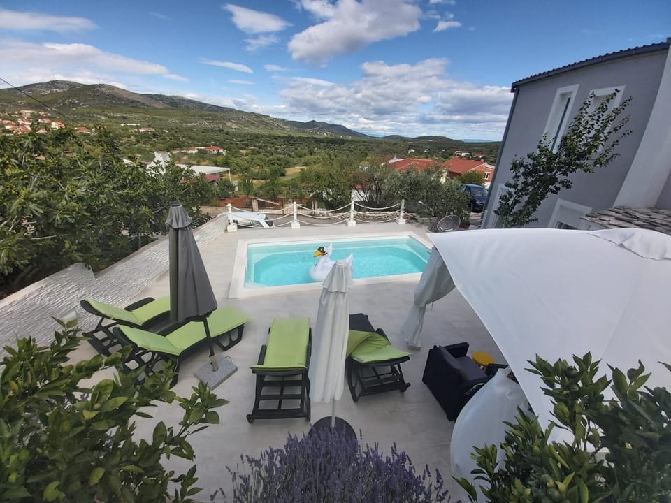 Property building, Activities, View (from property/room), Landmark view, Pool view, Swimming pool, Quiet street view