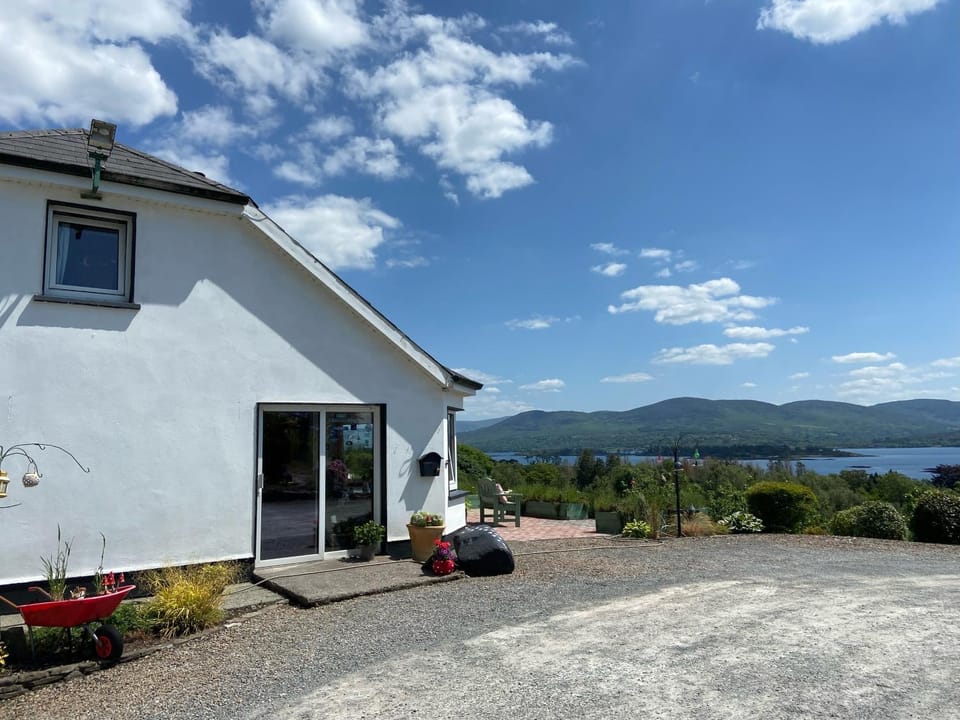 Property building, Natural landscape, Lake view, Mountain view
