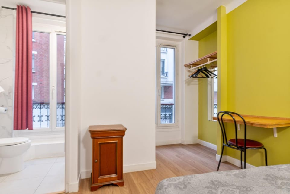 Toilet, Bed, Bathroom, Seating area, Bedroom