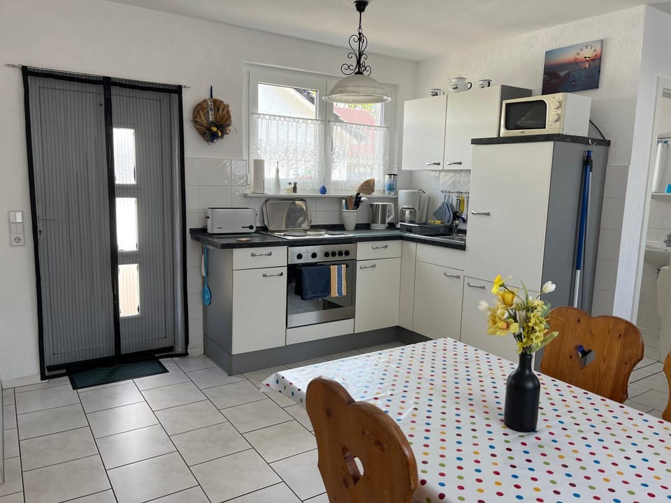 Kitchen or kitchenette, stove, toaster