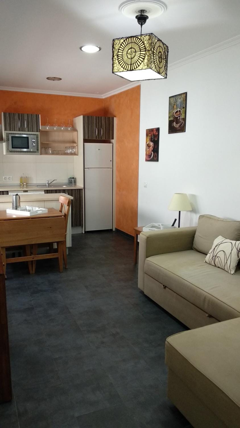Kitchen or kitchenette, Living room, Seating area, Dining area