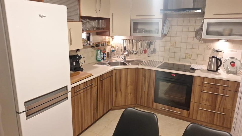 Kitchen or kitchenette, dishwasher, oven, stove, toaster