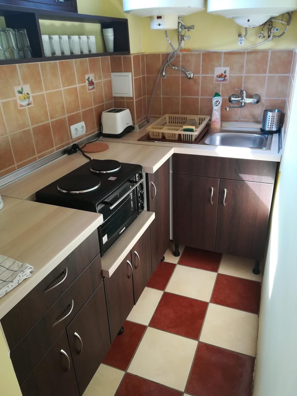 Kitchen or kitchenette, stove, toaster