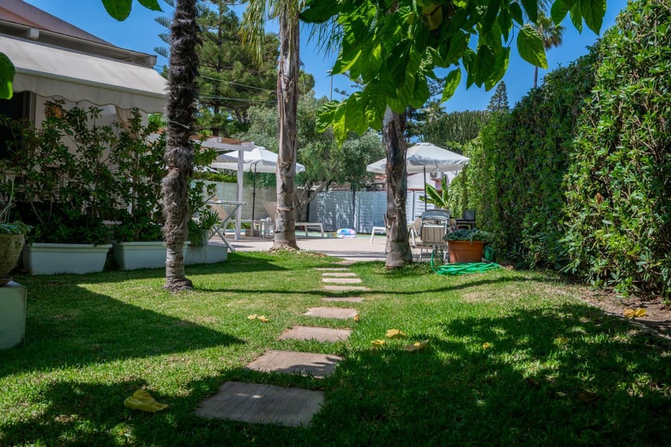 Property building, Patio, Natural landscape, Garden, Garden view