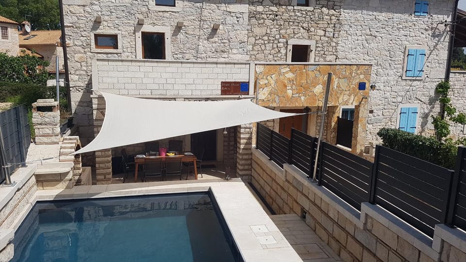 Property building, Patio, Day, Pool view, Swimming pool