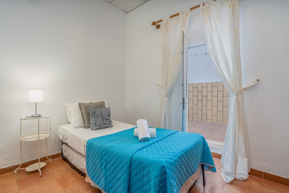 Property building, Bed, View (from property/room), Decorative detail, Decorative detail, Bedroom, On site, Guests, children, older children, Family, towels, wardrobe