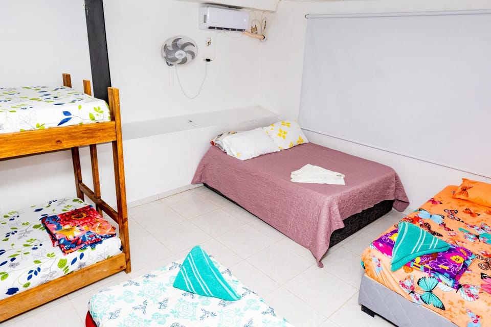 Bed, Photo of the whole room, Bedroom, bunk bed, towels, air conditioner