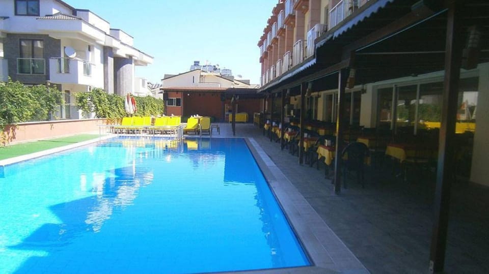 Property building, Pool view, Swimming pool, sunbed