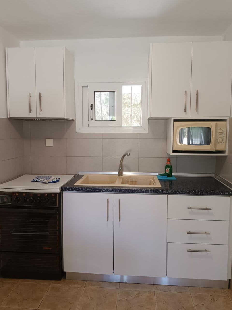 Kitchen or kitchenette, stove