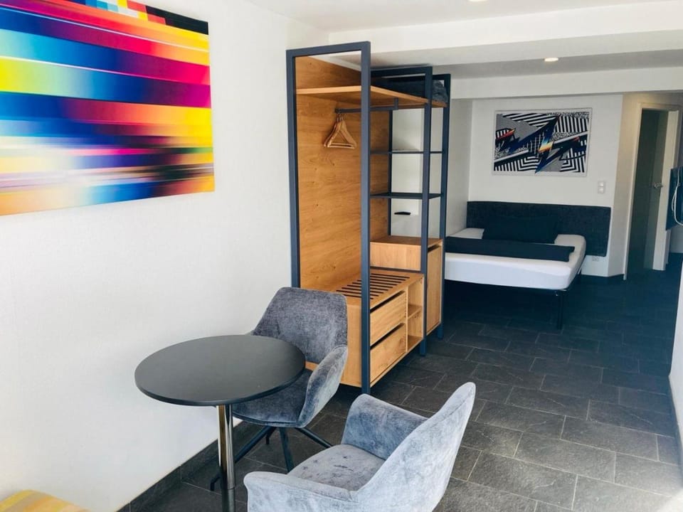 Bed, Seating area, Bedroom
