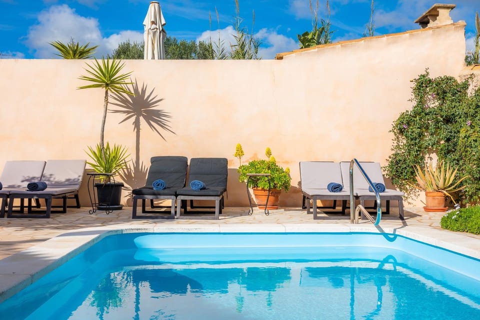 Property building, Living room, Swimming pool