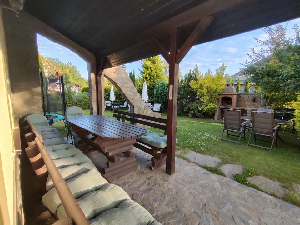 Property building, BBQ facilities, Balcony/Terrace, Seating area, Garden view