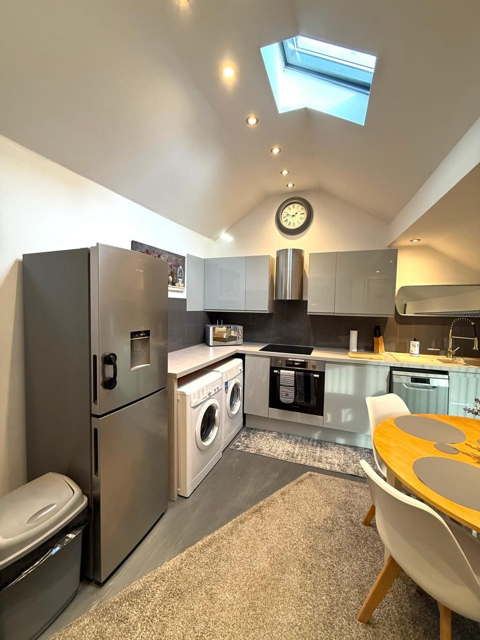 Kitchen or kitchenette, Dining area, dishwasher, oven, stove, toaster, washing machine, dryer