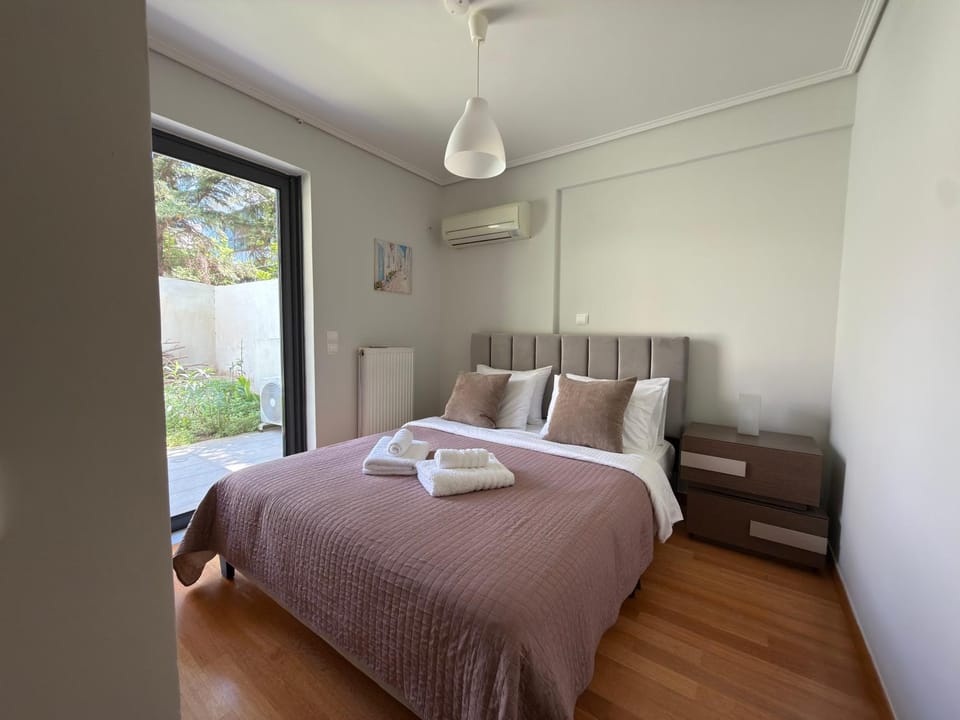 Bed, Photo of the whole room, Bedroom, towels, air conditioner