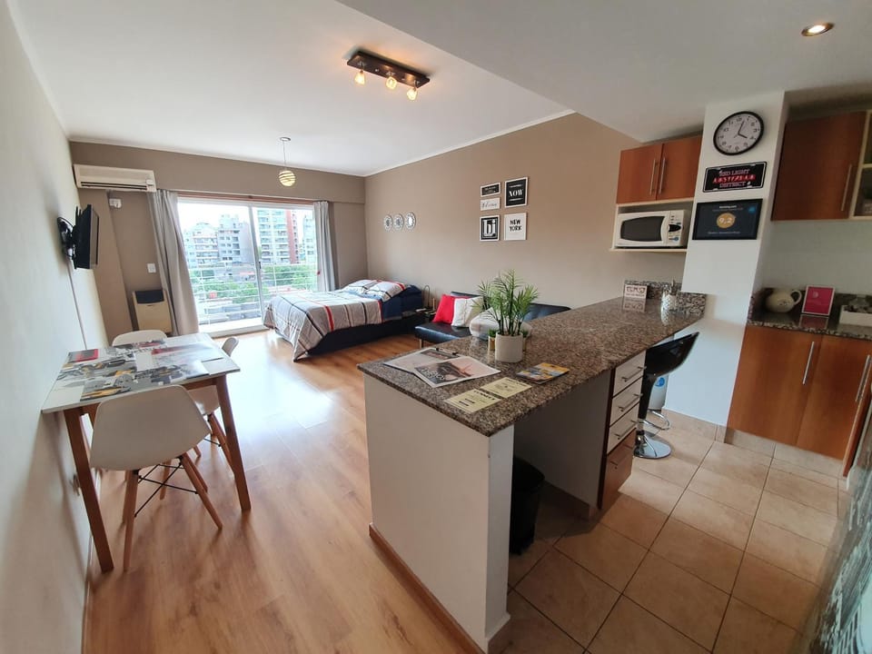 Bed, TV and multimedia, Kitchen or kitchenette, Living room, Photo of the whole room, Seating area, Dining area, Bedroom