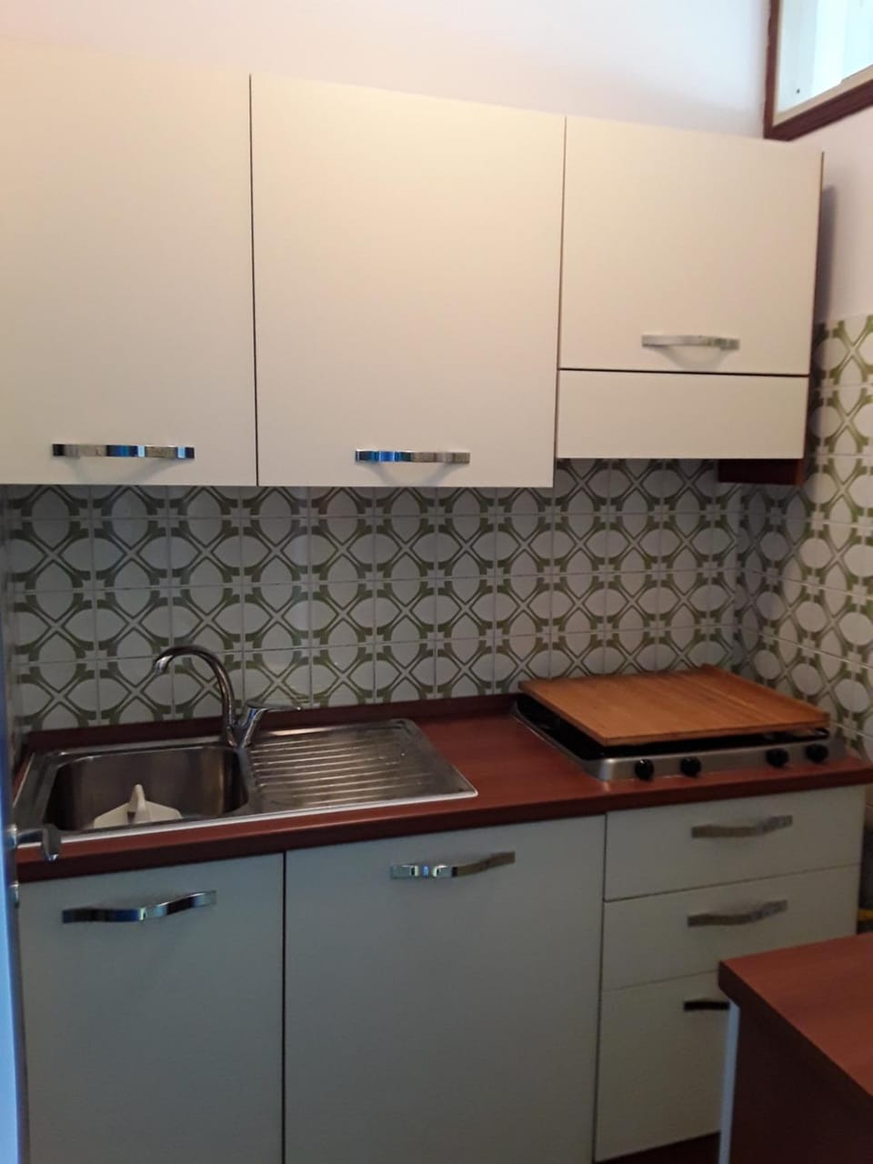 Kitchen or kitchenette, stove