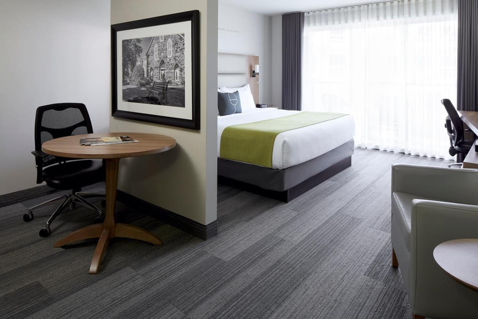 Bed, Living room, Seating area, Bedroom