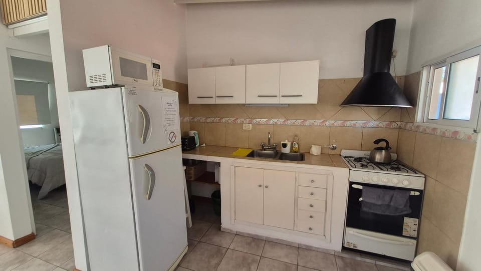 Kitchen or kitchenette, microwave, oven