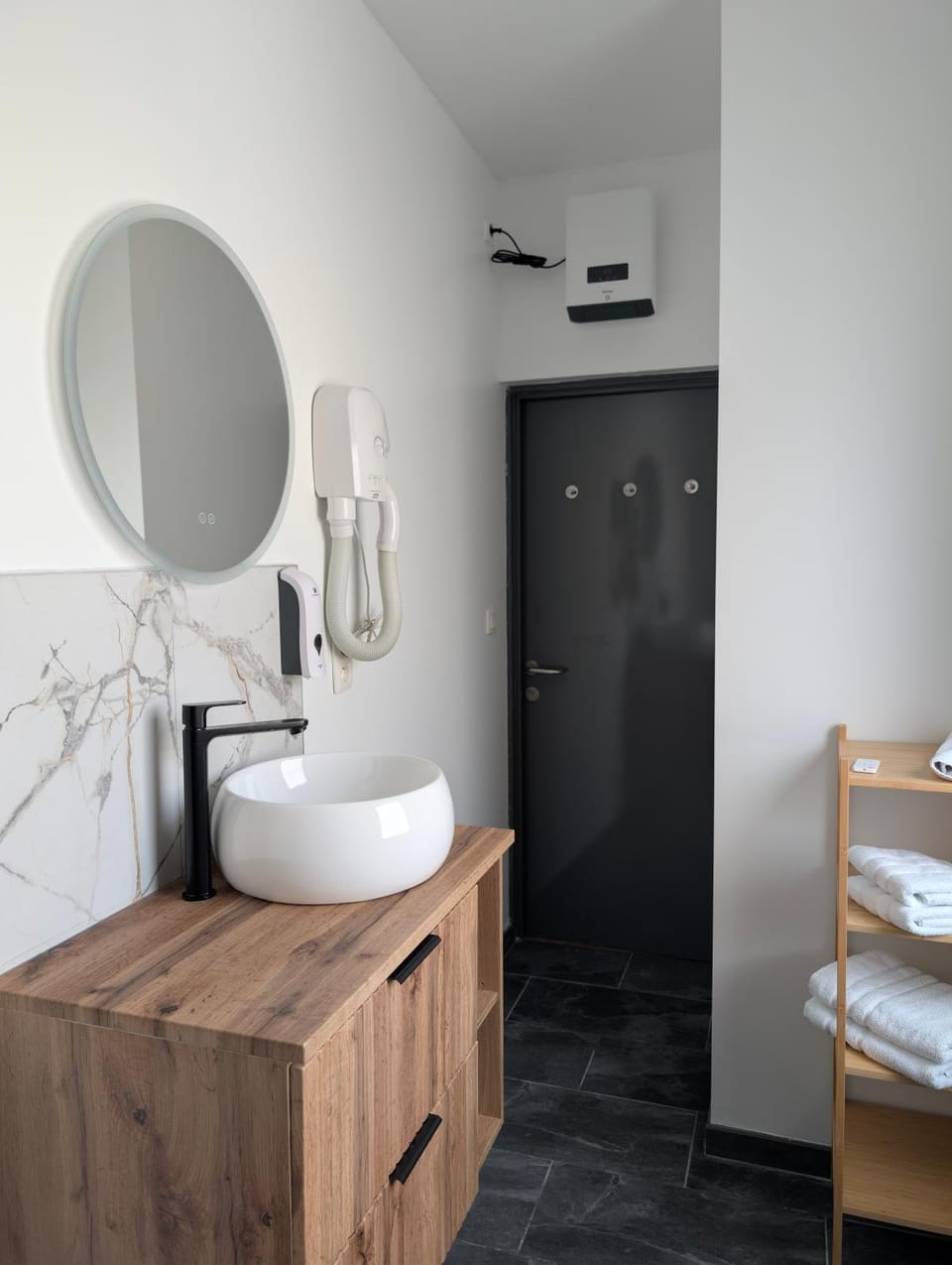 Bathroom, hair dryier, towels
