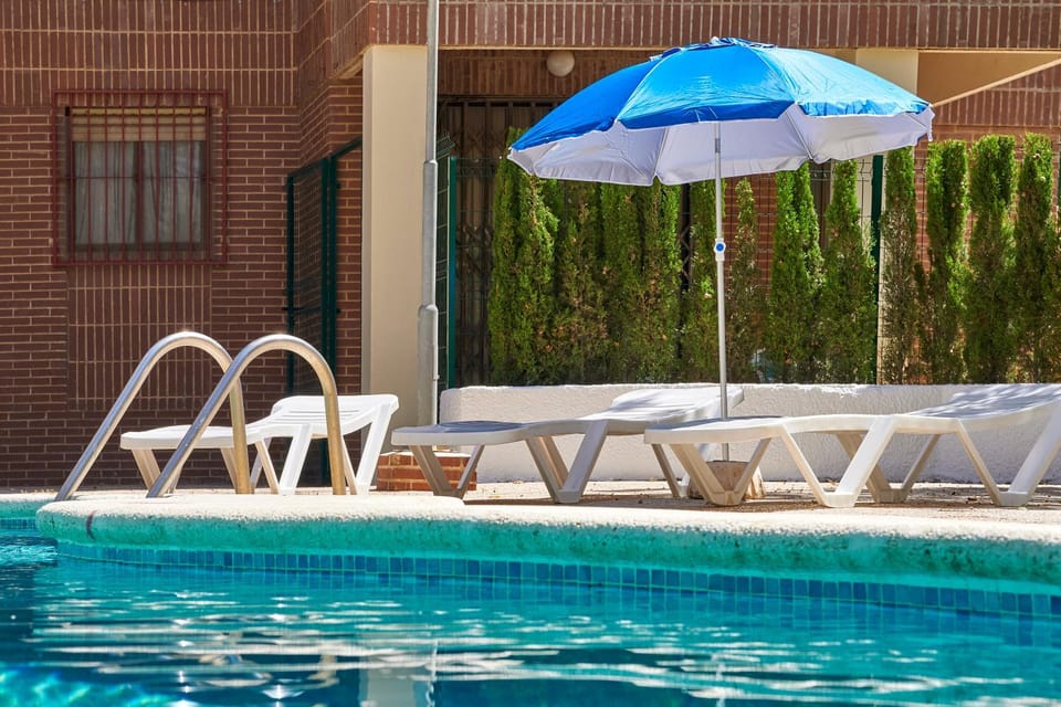 Swimming pool, sunbed
