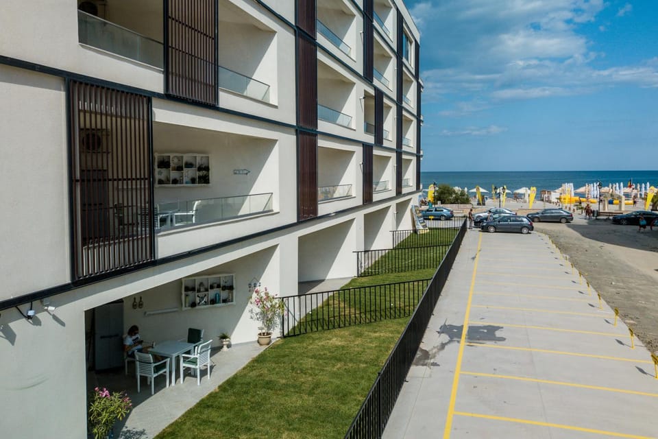 Property building, Day, Sea view, Street view, Parking