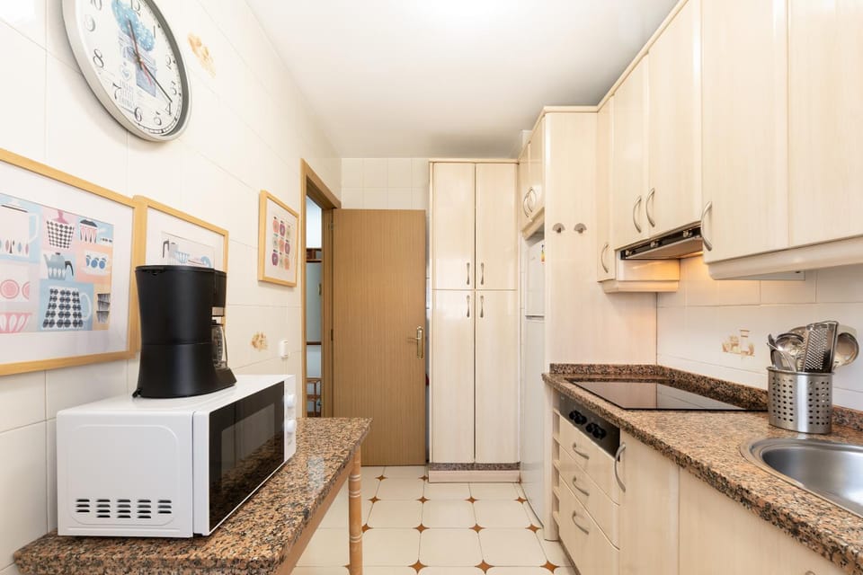 Kitchen or kitchenette, oven, stove, toaster