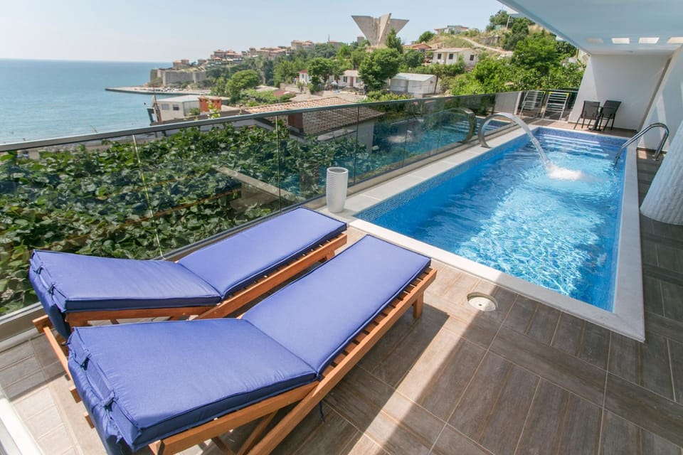 Day, View (from property/room), Pool view, Sea view, Swimming pool