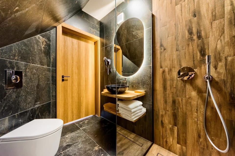 Shower, Toilet, Bathroom, hair dryier, towels