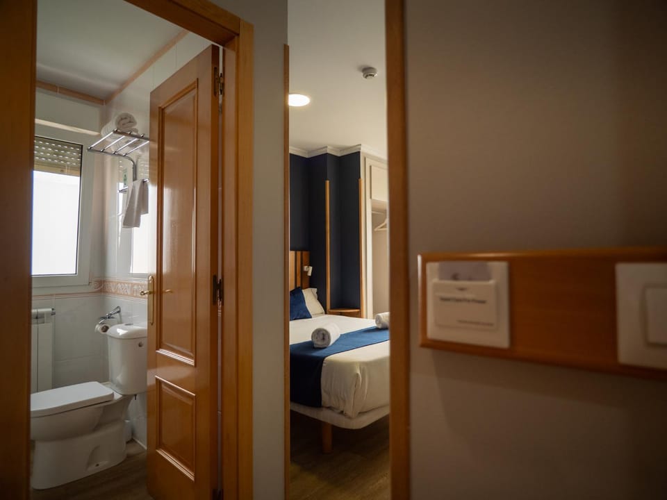 Toilet, Bed, Bathroom, Photo of the whole room, Bedroom, towels